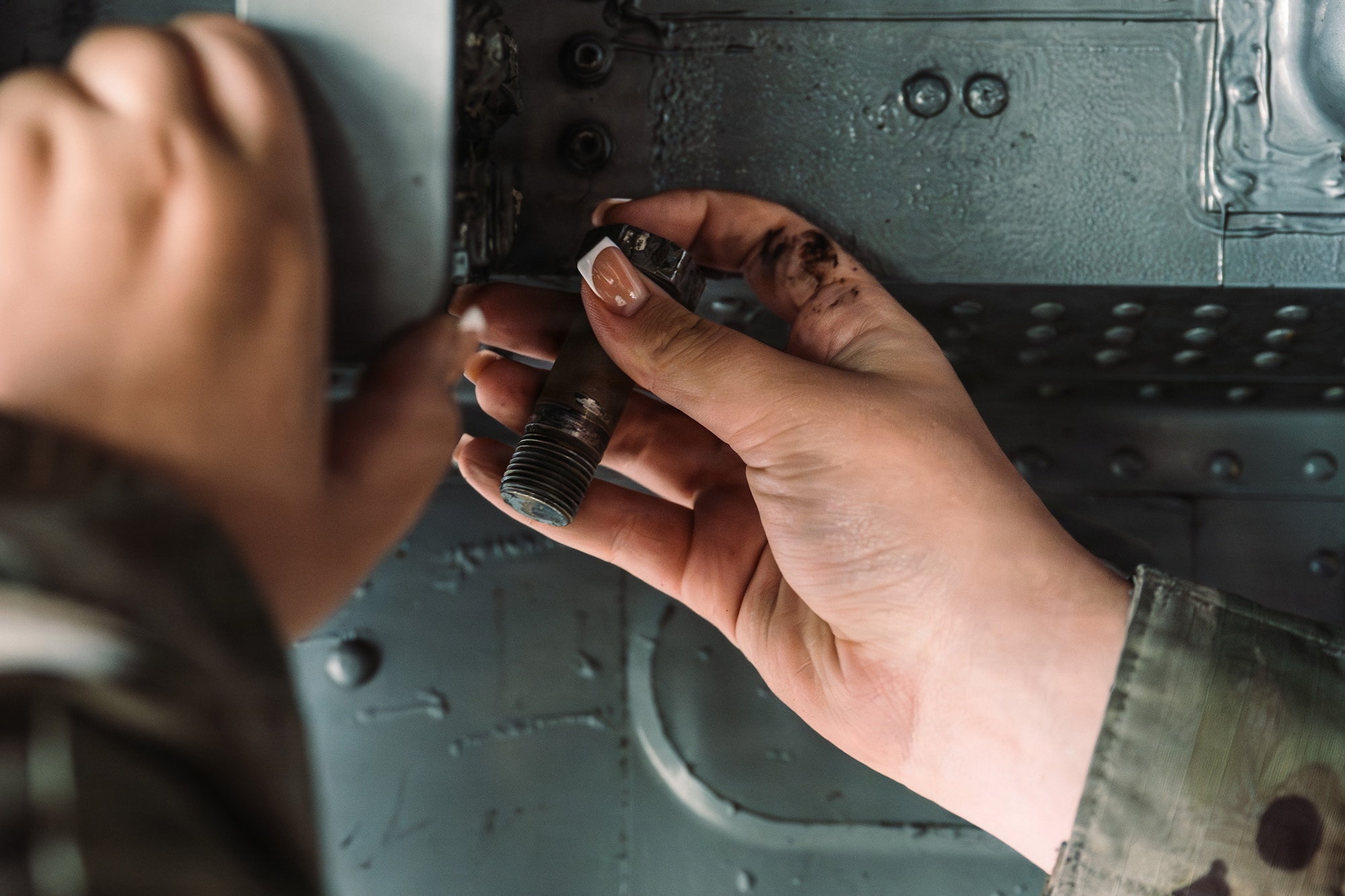 U.S. Air Force Airman 1st Class Vaiana Tauotaha-Goff, 86th Maintenance Squadron repair and reclamation apprentice, prepares to insert a bolt into a C-130J Super Hercules aircraft at Ramstein Air Base, Germany, June 2, 2026.