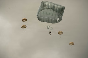 Paratroopers from Allied forces jump onto the drop zone at La Fiere, France, June 07, 2026. D-Day 82 commemorates the courage and sacrifice of Allied forces who fought for freedom, reminding us of the enduring strength of alliances and shared responsibility. (U.S. Army photo by Sgt. Noe Cork)