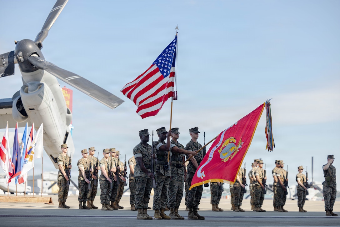 U.S. Marines with Marine Medium Tiltrotor Squadron (VMM) 261, Marine Aircraft Group 26, 2nd Marine Aircraft Wing, present the colors during a change of command ceremony at Marine Corps Air Station New River, North Carolina, May 29, 2026. The ceremony signified the transfer of responsibility, authority, and accountability from Lt. Col. Colin J. Culkin, from Texas, the off-going commanding officer of VMM-261, to Lt. Col. Joshua L. Foxton, from Maryland, the incoming commanding officer. (U.S. Marine Corps photo by Lance Cpl. Orlanys Diaz Figeuroa)