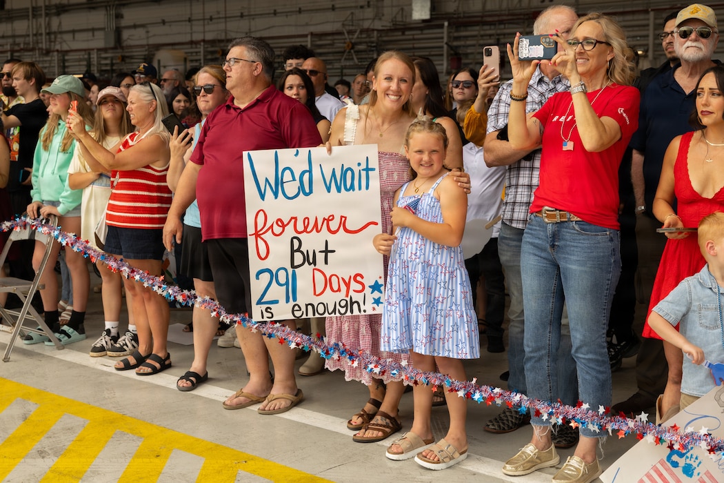 Family and friends of Marine Medium Tiltrotor Squadron (VMM) 263 (Reinforced), 22nd Marine Expeditionary Unit (Special Operations Capable), await to receive Marines during a deployment homecoming at Marine Corps Air Station New River, North Carolina, on June 1, 2026. U.S. military forces deployed to the Caribbean in support of the U.S. Southern Command mission, Department of War-directed operations, and the president’s priorities to disrupt illicit drug trafficking and protect the homeland. (U.S. Marine Corps photo by Lance Cpl. Jacsive Betancourt)