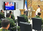 U.S. Army Warrant Officer Brett Patterson, Mississippi National Guard, discusses the U.S. National Incident Management System with Republic of Uzbekistan Ministry of Emergency Services personnel during a Department of War National Guard Bureau State Partnership engagement May 18, 2026, in Almalyk City, Uzbekistan. Photo by Sgt. 1st Class Shane Hamann.