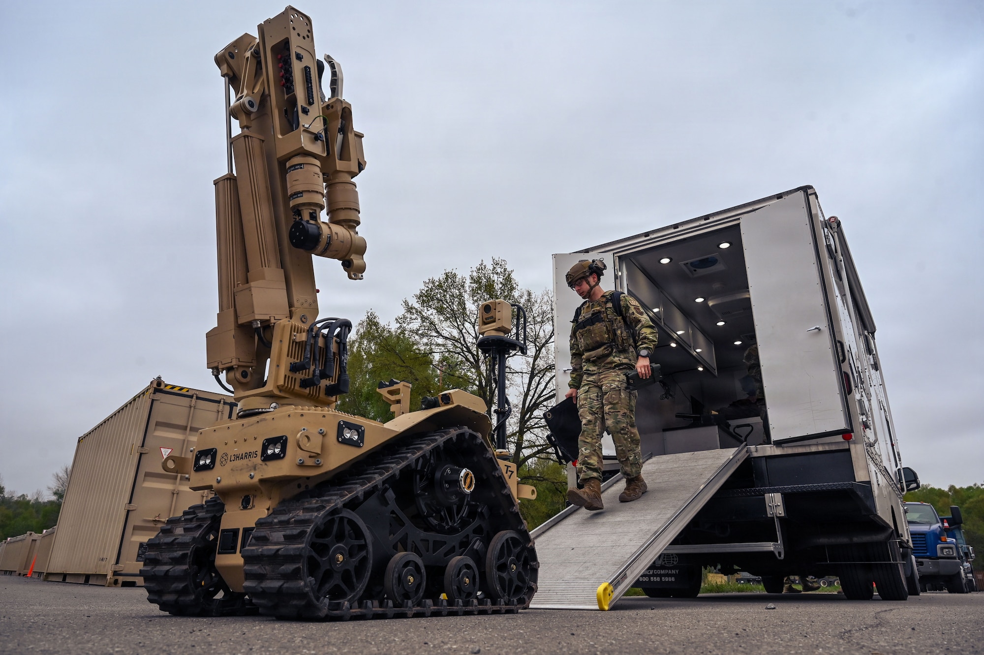 U.S. Air Force Senior Airman Poe, 786th Civil Engineer Squadron explosive ordnance disposal team member, checks the functionality of L3 Harris T7 Robotic System