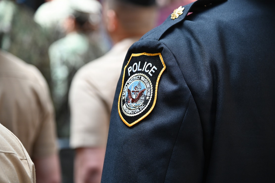 A U.S. Naval District Washington (NDW) Police officer attends the inaugural Naval Support Activity Washington (NSAW) Navy Security Force (NSF) Memorial and Celebration at the National Museum of the U.S. Navy.