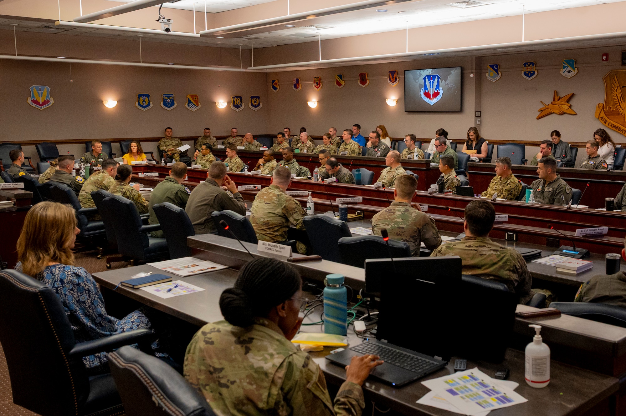 Commanders from across Air Combat Command listen to a presentation during the ACC Squadron Commander and Spouses Course at Joint Base Langley-Eustis, Virginia, April 13, 2026. The course prepares new ACC squadron commanders and their families to shoulder the responsibility of command in the world’s most lethal combat air force. (U.S. Air Force photo by Staff Sgt. Michael Bowman)