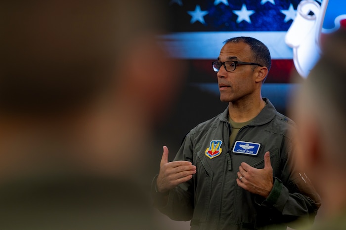 U.S. Air Force Gen. Adrian Spain, commander of Air Combat Command, speaks to attendees during the ACC Squadron Commander and Spouses Course at Joint Base Langley-Eustis, Virginia, April 13, 2026. The briefs familiarized attendees with the offices and resources available to Airmen and their families, ensuring no military family goes without the assistance they may need in times of hardship. (U.S. Air Force photo by Staff Sgt. Michael Bowman)
