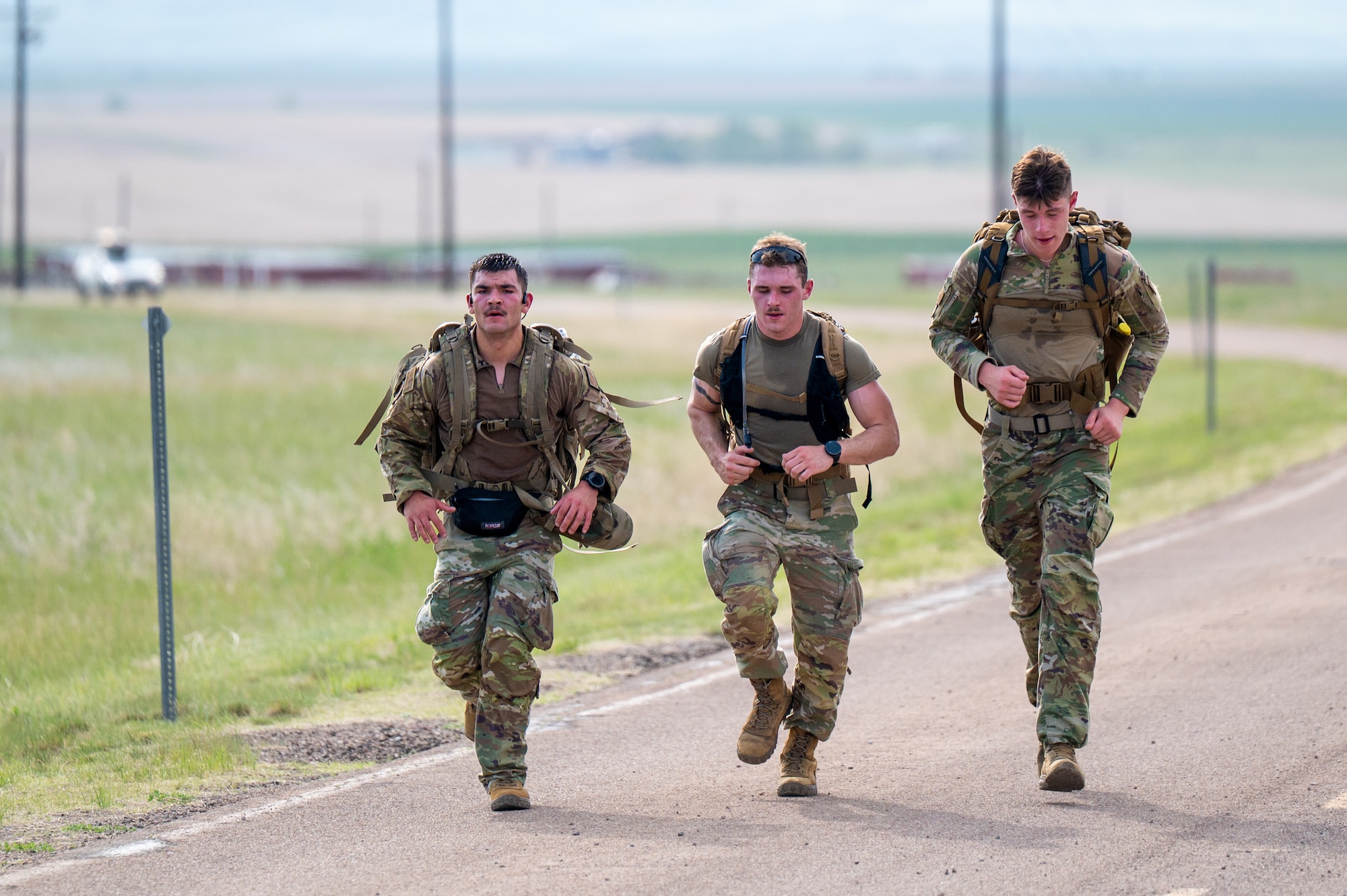 Participants in a Norwegian Foot March break into a run at Malmstrom Air Force Base, Montana, May 26, 2026.
