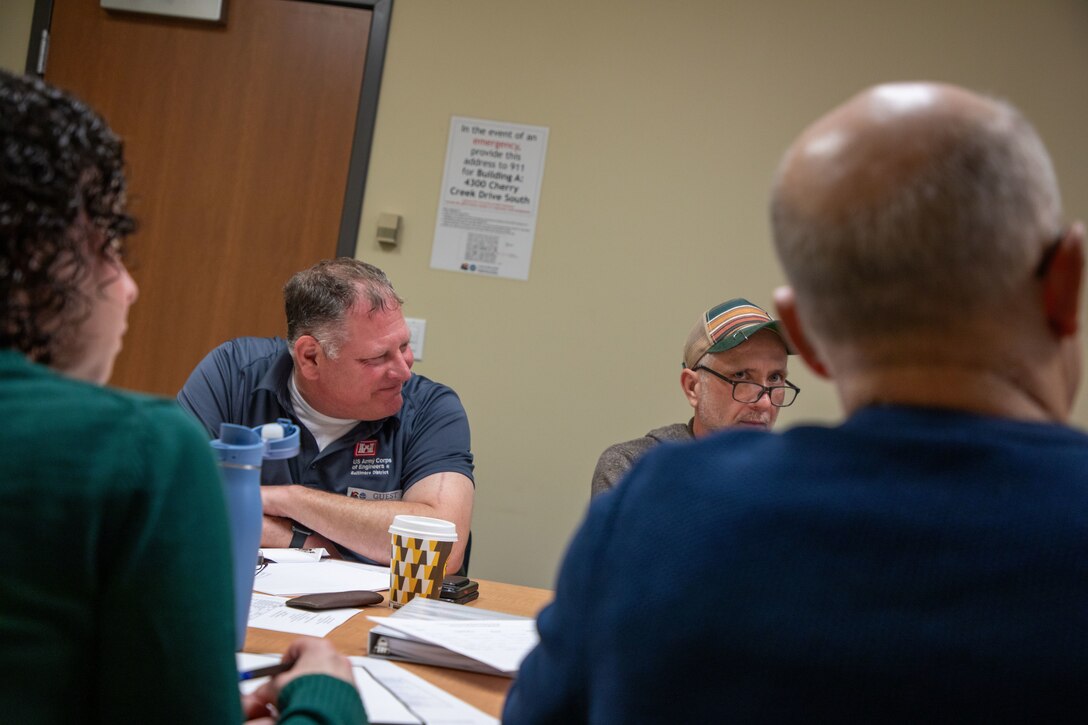 Wayne Davis, left, of the U.S. Army Corps of Engineers Baltimore District, attends a meeting at the Colorado Department of Public Health and Environment office to discuss the Land Use Controls Implementation Plan for the former Camp George West Artillery Range in Denver, April 30, 2026. (U.S. Army photo by Makenzie Leonard)