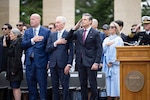 Secretary of War Pete Hegseth, U.S. Ambassador to France Charles Kushner and other members of the official party render honors during a ceremony to commemorate the 82nd anniversary of D-Day at the Normandy American Cemetery in Colleville-sur-Mer, France, June 6, 2026.