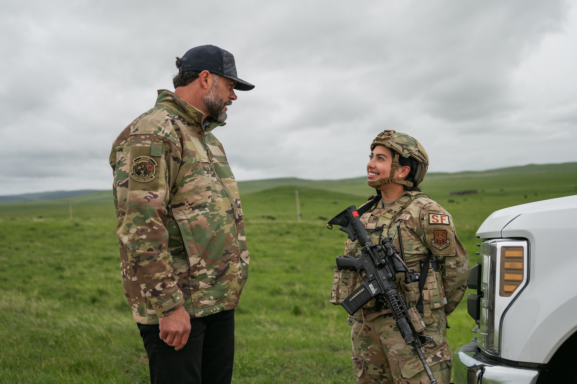 The Under Secretary of the Air Force talks to a uniformed service member.