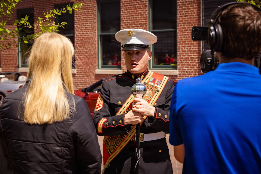 U.S. Marines with the Marine Corps Recruit Depot Parris Island Marine Band, march through the streets of Louisville, KY., during the Zoeller Pump Company Pegasus Parade on Apr. 26, 2026. The Parris Island Marine Band performed musical numbers alongside local organizations and performers for Louisville residents celebrating the Kentucky Derby. (U.S. Marine Corps photo by Lance Cpl. Jacob Claudell)