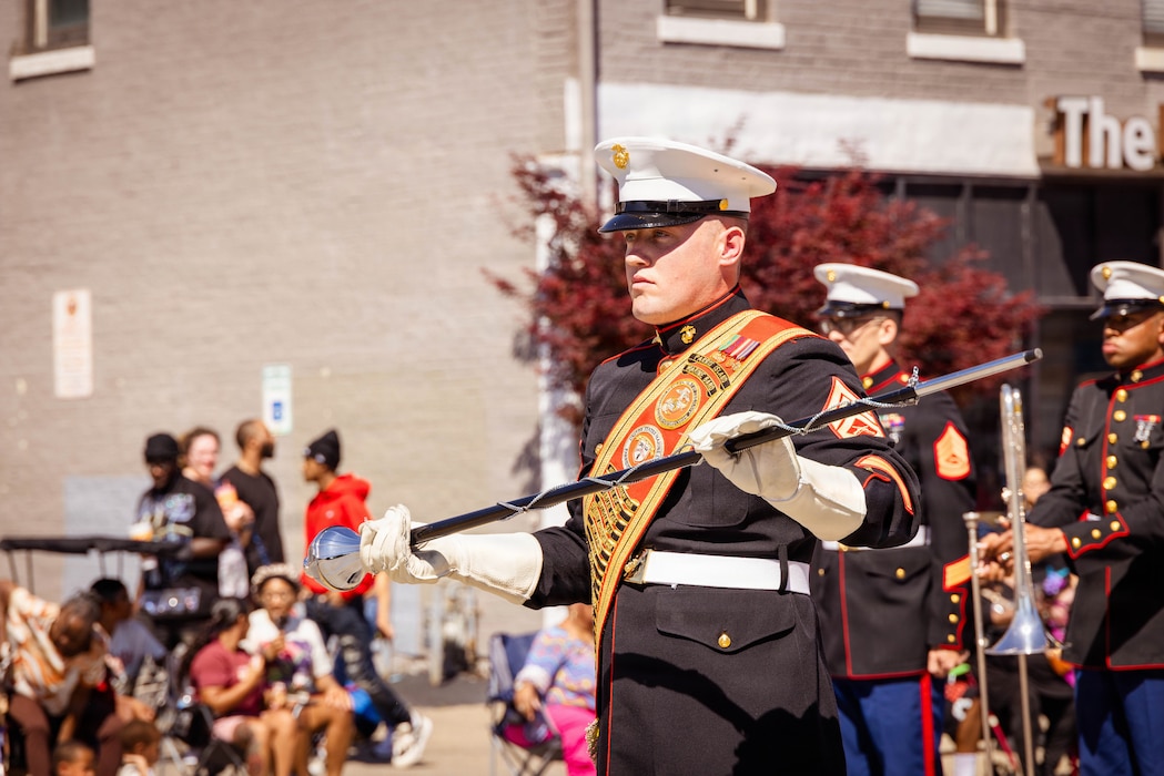 U.S. Marines with the Marine Corps Recruit Depot Parris Island Marine Band, march through the streets of Louisville, KY., during the Zoeller Pump Company Pegasus Parade on Apr. 26, 2026. The Parris Island Marine Band performed musical numbers alongside local organizations and performers for Louisville residents celebrating the Kentucky Derby. (U.S. Marine Corps photo by Lance Cpl. Jacob Claudell)