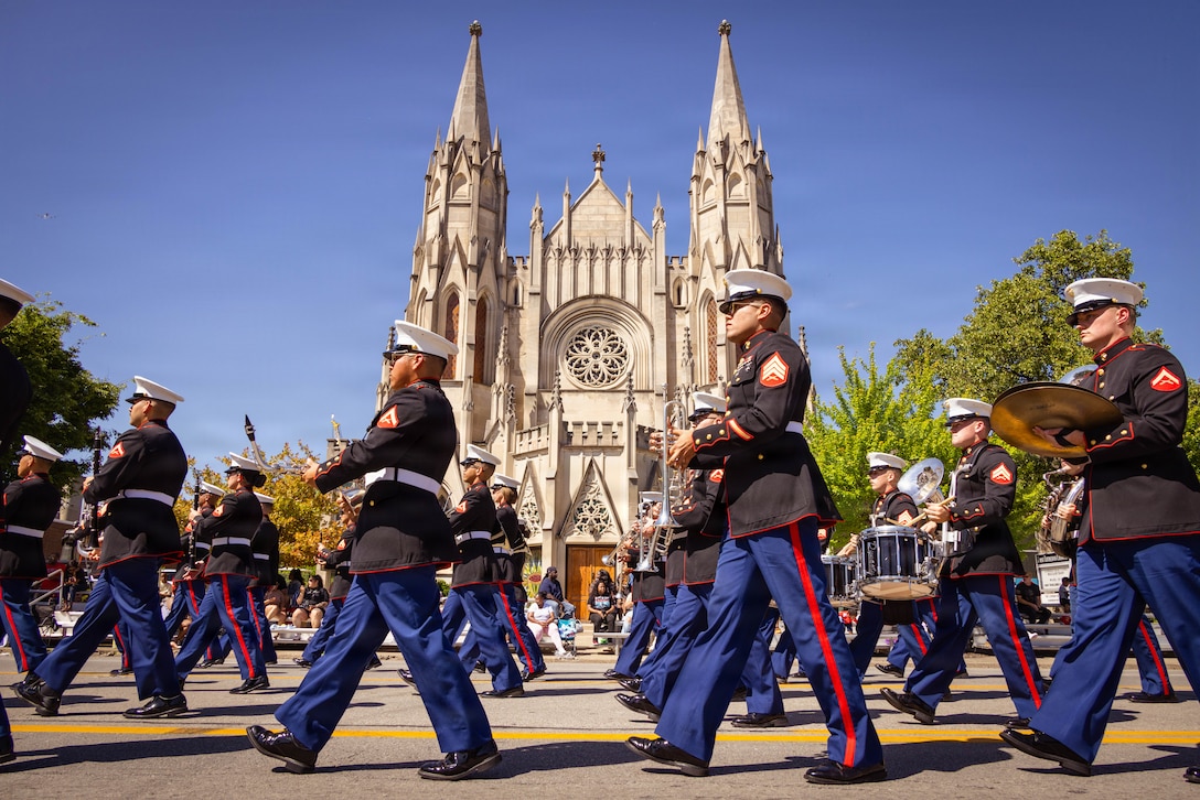U.S. Marines with the Marine Corps Recruit Depot Parris Island Marine Band, march through the streets of Louisville, KY., during the Zoeller Pump Company Pegasus Parade on Apr. 26, 2026. The Parris Island Marine Band performed musical numbers alongside local organizations and performers for Louisville residents celebrating the Kentucky Derby. (U.S. Marine Corps photo by Lance Cpl. Jacob Claudell)