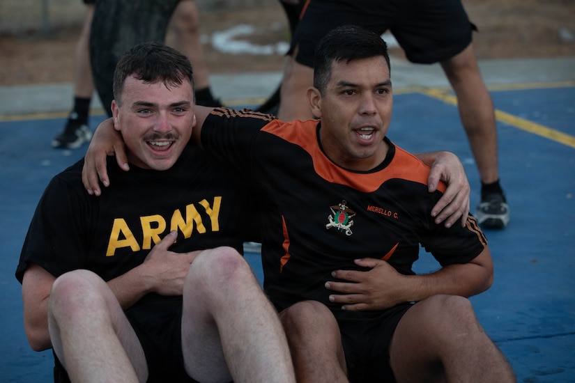 Spc. Kody Pulaski, assigned to 3rd Platoon, 940th Military Police Company, participates in morning physical training alongside an Ecuadorian sailor during Exercise El Gato 2026 in Salinas, Ecuador, May 14, 2026.