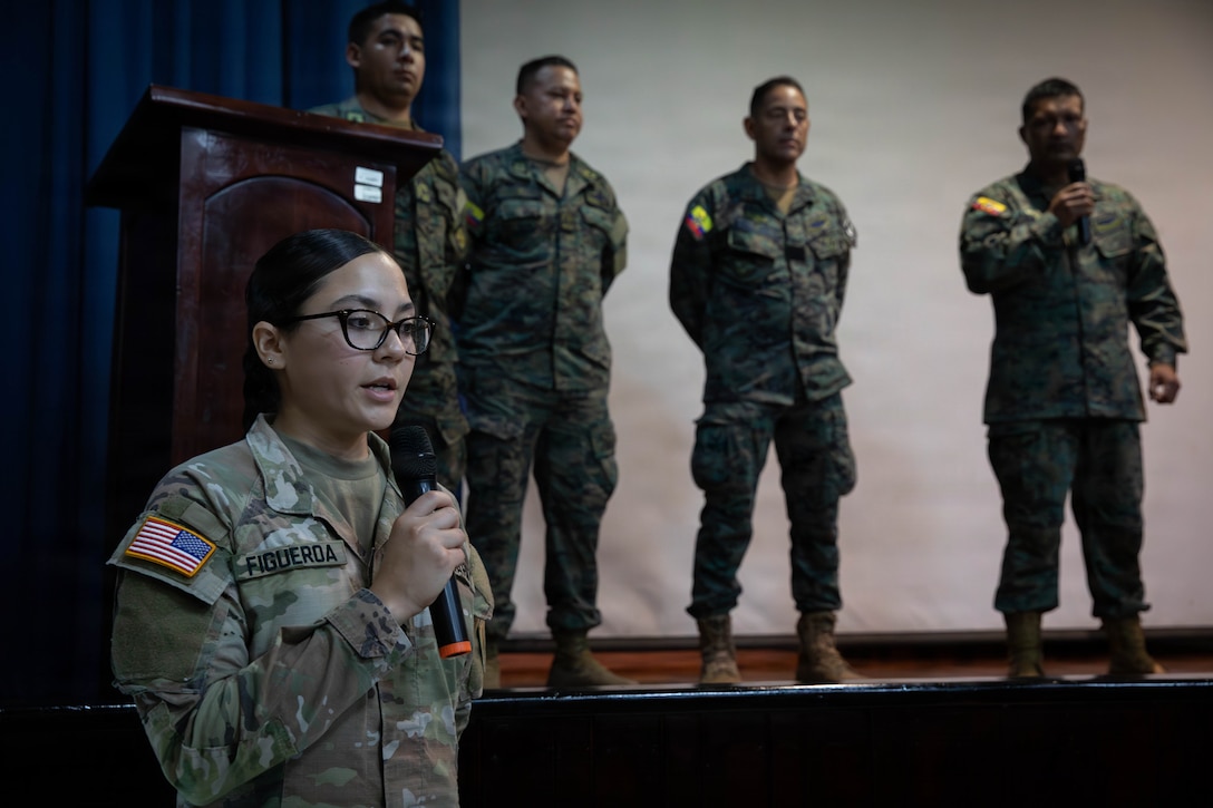 Sgt. Aide Figueroa, assigned to the 38th Infantry Division Artillery, assists with an interpersonal communication class during Exercise El Gato 2026 in Salinas, Ecuador, May 12, 2026.