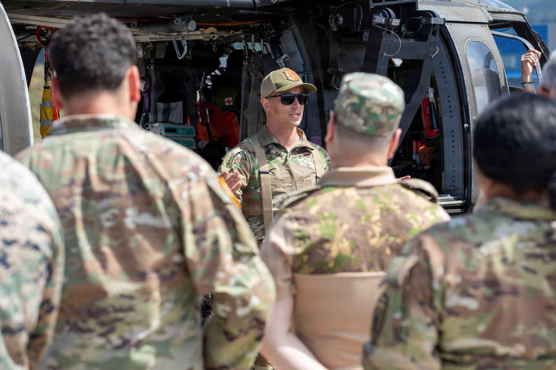 U.S. Army 1st Lieutenant Dustin Haubner, with Task Force Griffin (KFOR 35, TF Aviation) going over the mission  prior to flying the UH-60 Black Hawk during their deployment to Kosovo.