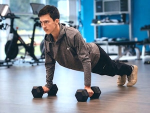 Phoenix Juneau Austin strengthens his arms and core during a workout at a local gym in Long Beach, California, April 29, 2026. Austin is preparing for the physical demands of the Air Force Officer Training School at Maxwell Air Force Base in Montgomery, Alabama. (Courtesy photo by Dave Austin)