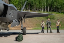 From left, U.S. Air Force Staff Sgt. Christian Cornwell, 48th Equipment Maintenance Squadron wheel and tire technician, Capt. Logan Halverson, 493rd Fighter Squadron F-35A Lightning II pilot, and Airman 1st Class Edgar Rosas, 493rd Fighter Generation Squadron crew chief, conduct preflight checks on an F-35A Lightning II aircraft during Ramstein Flag 26 at Pirkkala Air Base, Finland, June 8, 2026. Multi-capable Airmen bypass traditional stovepiped roles, allowing a small team of maintainers to handle everything from fueling and loading to basic security and communications. (U.S. Air Force photo by Tech. Sgt. Christine Groening)