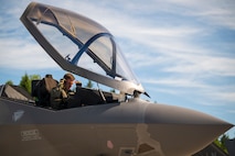 U.S. Air Force Capt. Logan Halverson, 493rd Fighter Squadron F-35A Lightning II pilot, conducts preflight checks during Ramstein Flag 26 at Pirkkala Air Base, June 8, 2026. RAFL26 serves as a testing ground for new operational concepts, ensuring U.S. Air Forces in Europe-Air Forces Africa remain agile enough to counter rapid shifts in modern warfare. (U.S. Air Force photo by Tech. Sgt. Christine Groening)