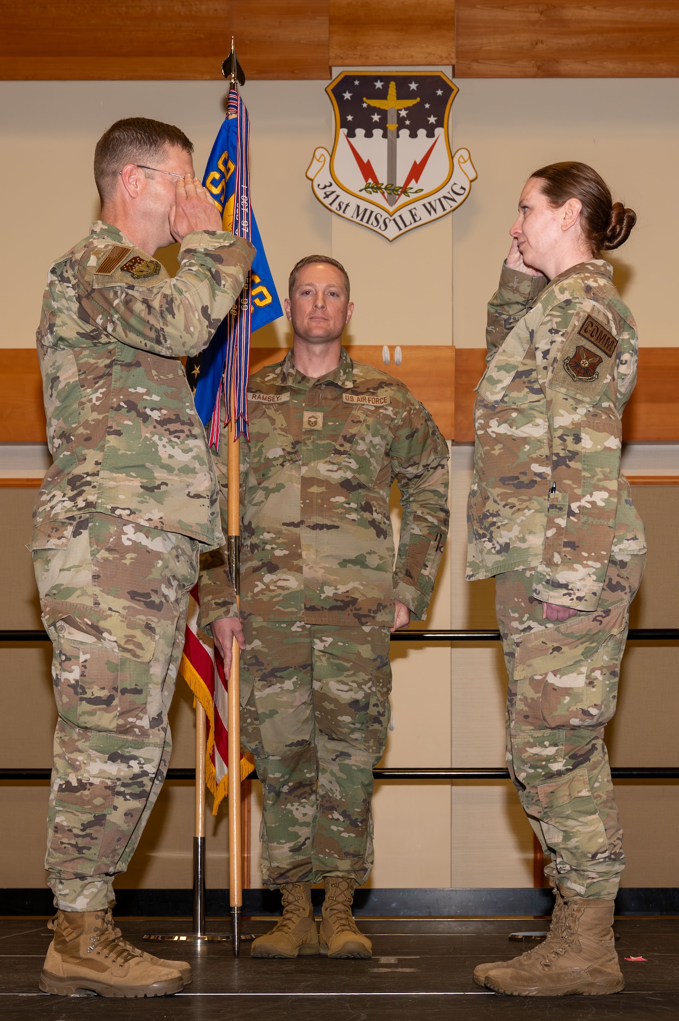 U.S. Air Force Lt. Col. Danielle Shipman, right, incoming commander of the 341st Communications Squadron, renders a salute to Col. Brian Low, 341st Mission Support Group commander, during a change of command ceremony at Malmstrom AFB, Montana, June 4, 2026. The 341st CS maintains and manages the data networks and communications systems, ensuring that Malmstrom teams can continuously operate on stable, secure networks. (U.S. Air Force photo by Airman 1st Class Ethan Wilson)
