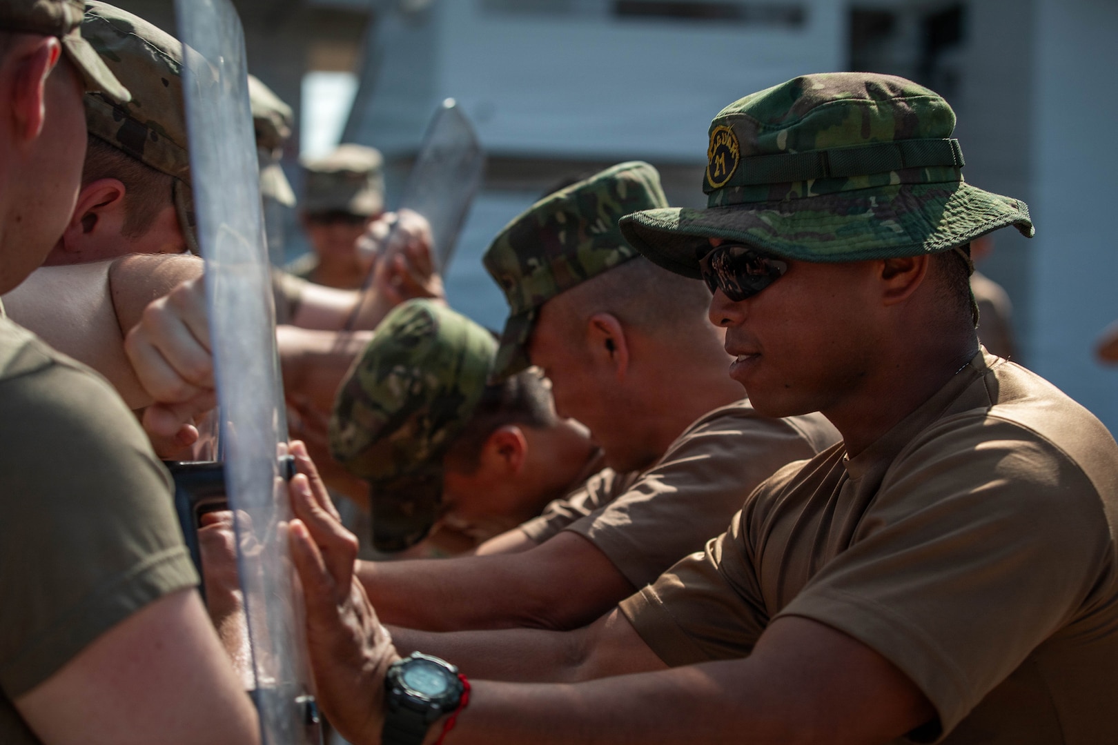 Soldiers of the Ecuadorian Army attempt to break through a line formation held by Soldiers assigned to 1st Platoon, 940th Military Police Company, during Exercise El Gato 2026 in Salinas, Ecuador, May 15, 2026.