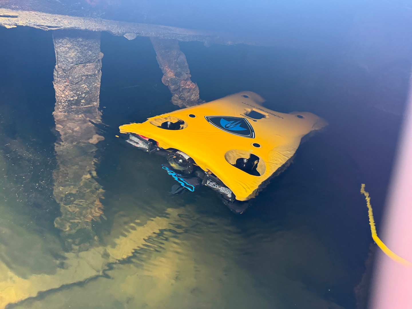 U.S. Coast Guard Divers, CGIS Investigators and RBDF personnel utilize a remotely operated underwater vehicle to search for a missing person during a CGIS investigation in the Bahamas, Jun. 4, 2026. The Coast Guard's efforts were supported by the Royal Bahamas Police Force, the Royal Bahamas Defence Force, and K-9 Maggie from the Broward County Sheriff's Office. Coast Guard units included the Coast Guard Cutter Margaret Norvell (WPC-1105), home ported in Miami, Florida, and Coast Guard divers. (U.S. Coast Guard photo by Chief Warrant Officer Adam Harris)