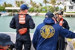 A USCGC Margaret Norvell (WPC-1105) boat crew and CGIS Investigators search for a missing person during a CGIS investigation in the Bahamas, Jun. 3, 2026. Search operations employed a range of specialized capabilities, including divers, remotely operated underwater vehicles, unmanned aerial systems, and a cadaver dog to thoroughly examine newly identified areas of interest. (U.S. Coast Guard photo by Petty Officer 1st Class Riley Perkofski)