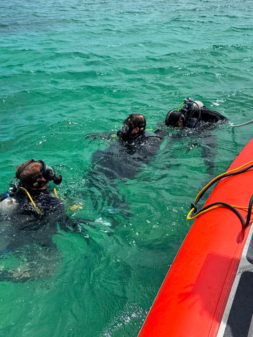 U.S. Coast Guard Divers search for a missing person during a CGIS investigation in the Bahamas, Jun. 3, 2026. The Coast Guard's efforts were supported by the Royal Bahamas Police Force, the Royal Bahamas Defence Force, and K-9 Maggie from the Broward County Sheriff's Office. Coast Guard units included the Coast Guard Cutter Margaret Norvell (WPC-1105), home ported in Miami, Florida, and Coast Guard divers. (U.S. Coast Guard photo by Petty Officer 1st Class Riley Perkofski)