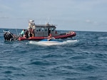 A Coast Guard Station Marathon boat crew rescued three boaters after their vessel capsized approximately 5 miles south of Little Palm Island in Little Torch Key, Florida, June 8, 2026. The boat crew transported the three boaters to Bahia Honda State Park with no injuries reported. (U.S. Coast Guard photo)