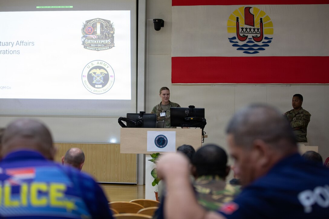 TAHITI, French Polynesia-- 1st Lt. Emma Barton, the platoon leader and officer in charge of the 962 Quartermaster Company mortuary affairs team at Marara 26, welcomes guest from multiple nations to an informative brief and demonstration of mortuary affairs capabilities in Tahiti, French Polynesia, June 6, 2026.