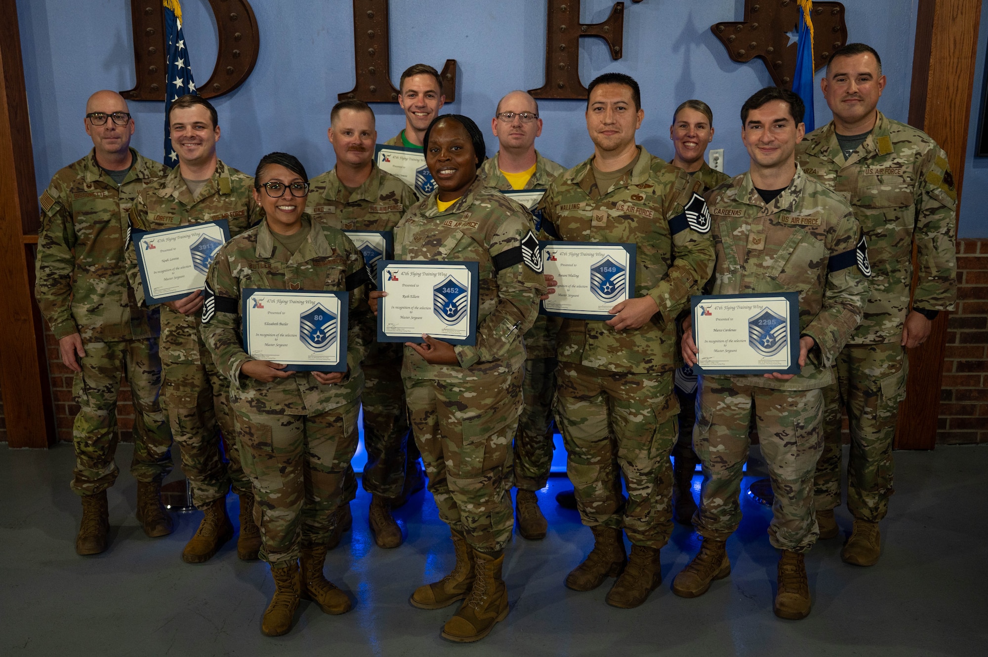 Laughlin’s newest master sergeant selects pose for a group photo.