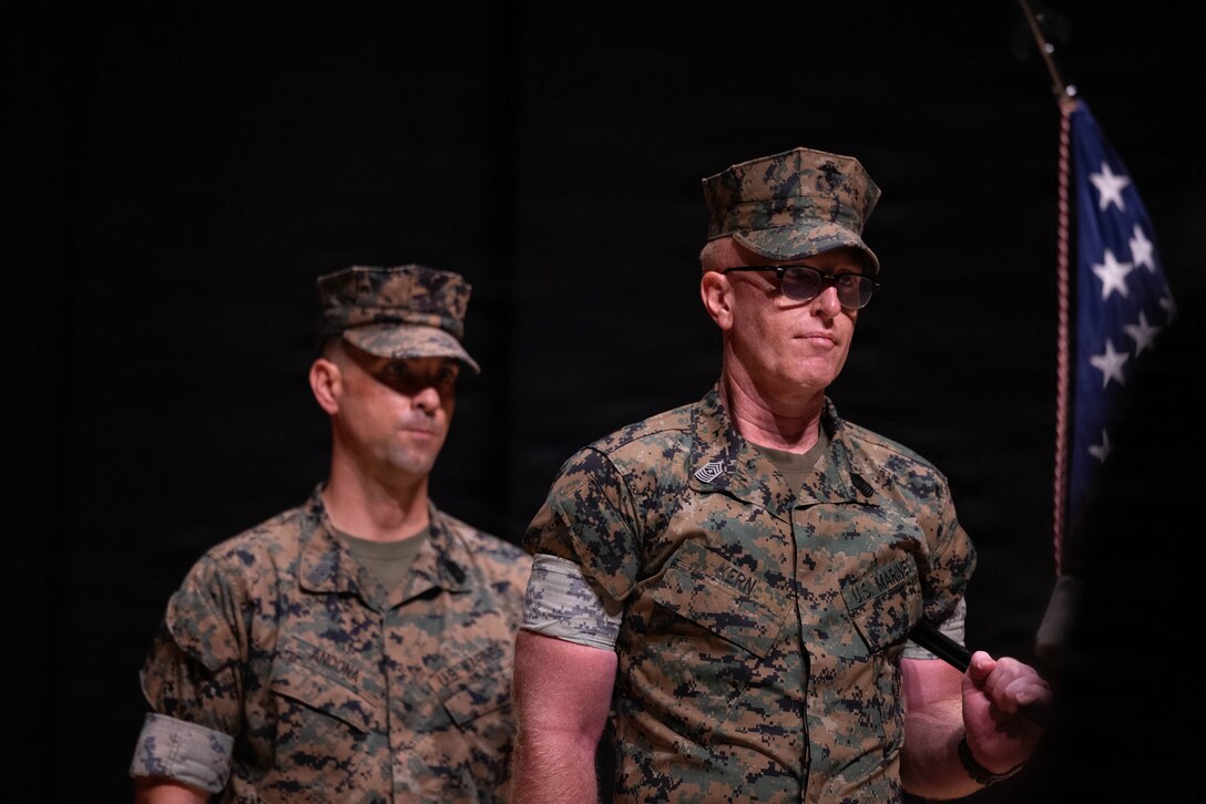U.S. Marine Corps Sgt. Maj. Steven Kern, right, the oncoming sergeant major of Marine Aerial Refueler Transport Squadron (VMGR) 152, Marine Aircraft Group 12, 1st Marine Aircraft Wing, and a native of Ohio, and Sgt. Maj. Lee Ancona, the outgoing sergeant major of VMGR-152, MAG-12, 1st MAW, and a native of Antioch, California, march during a relief and appointment ceremony at Marine Corps Air Station Iwakuni, Japan, June 3, 2026. Relief and appointment ceremonies are a tradition that represents the transfer of responsibility, authority, and accountability from one sergeant major to another. (U.S. Marine Corps photo by Lance Cpl. Siwan Lewis)