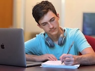 Phoenix Juneau Austin studies for his Doctorate in Business Administration degree online through Capella University in Minneapolis, Minnesota, June 5, 2026. (Courtesy photo by Dave Austin)