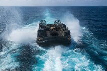 U.S. Navy landing craft, air cushion with Assault Craft Unit 5, disembarks Wasp-class amphibious assault ship USS Boxer (LHD 4) during LCAC operations in the South China Sea, June 5, 2026.