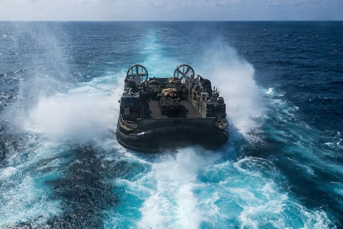 U.S. Navy landing craft, air cushion with Assault Craft Unit 5, disembarks Wasp-class amphibious assault ship USS Boxer (LHD 4) during LCAC operations in the South China Sea, June 5, 2026.