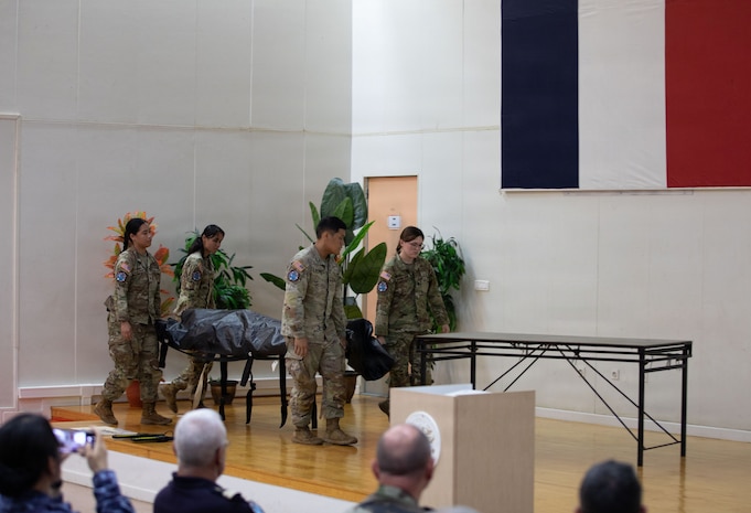 TAHITI, French Polynesia-- Soldiers from the 962 Quartermaster Company demonstrate the steps they take to process human remains with respect and reverence on a model in an informational brief during Marara 26 in Tahiti, Frech Polynesia, June 6, 2026.