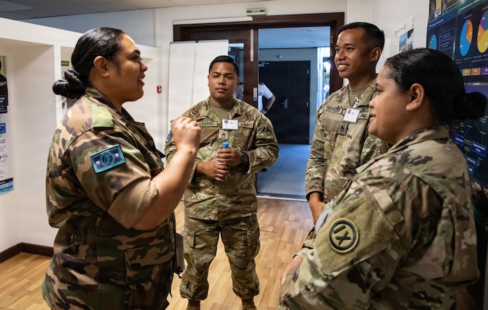 TAHITI, French Polynesia-- Soldiers from the 962 Quartermaster Company discuss their unique military operational specialty of mortuary affairs with a member of the Pacific Readiness Group following their brief during Marara 26 in Tahiti, French Polynesia, June 5, 2026.