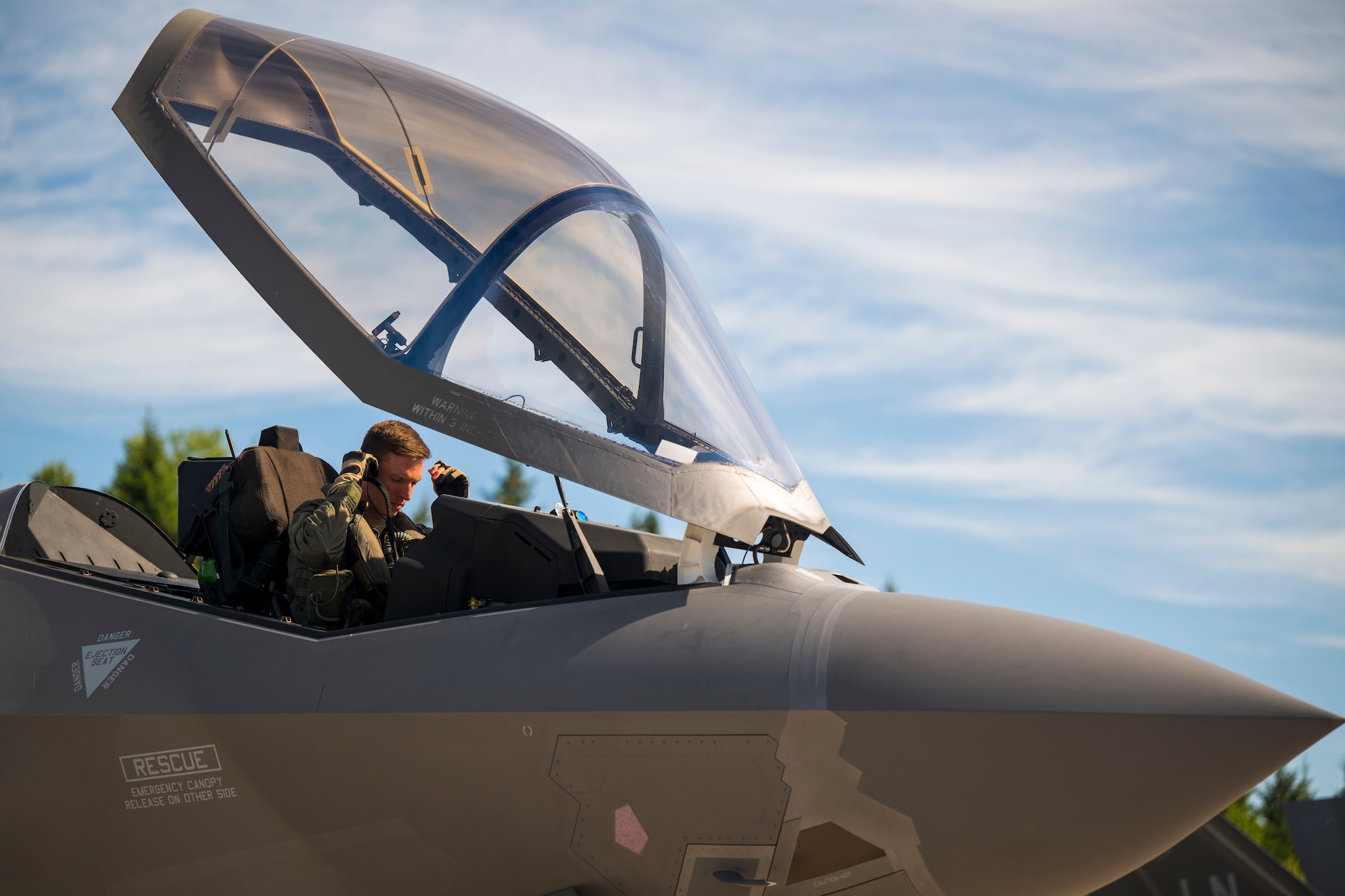 U.S. Air Force Capt. Logan Halverson, 493rd Fighter Squadron F-35A Lightning II pilot, conducts preflight checks during Ramstein Flag 26 at Pirkkala Air Base, June 8, 2026. RAFL26 serves as a testing ground for new operational concepts, ensuring U.S. Air Forces in Europe-Air Forces Africa remain agile enough to counter rapid shifts in modern warfare. (U.S. Air Force photo by Tech. Sgt. Christine Groening)