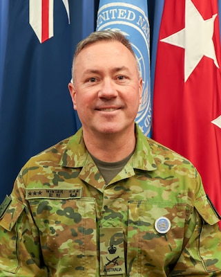 Australian Army Lt. Gen. Scott A. Winter, deputy commander of United Nations Command, poses for a command photo at USFK Building.