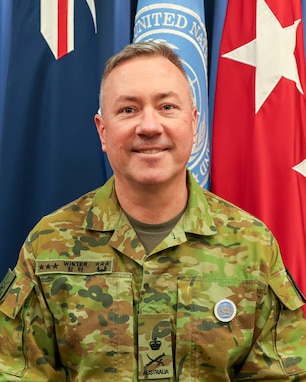 Australian Army Lt. Gen. Scott A. Winter, deputy commander of United Nations Command, poses for a command photo at USFK Building.