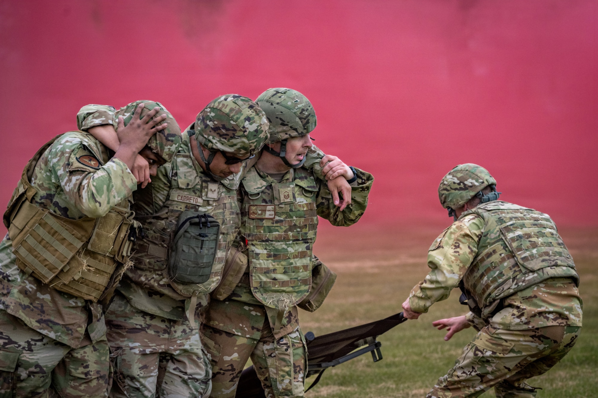 U.S. Airmen assigned to the 35th Civil Engineer Squadron evacuate personnel and transport simulated casualties during a small unmanned aircraft system attack exercise at Misawa Air Base, Japan, May 20, 2026. The scenario tested Airmen’s ability to apply casualty response training and coordinate movement during a rapidly evolving threat environment. (U.S. Air Force photo by Senior Airman Andre Medina)