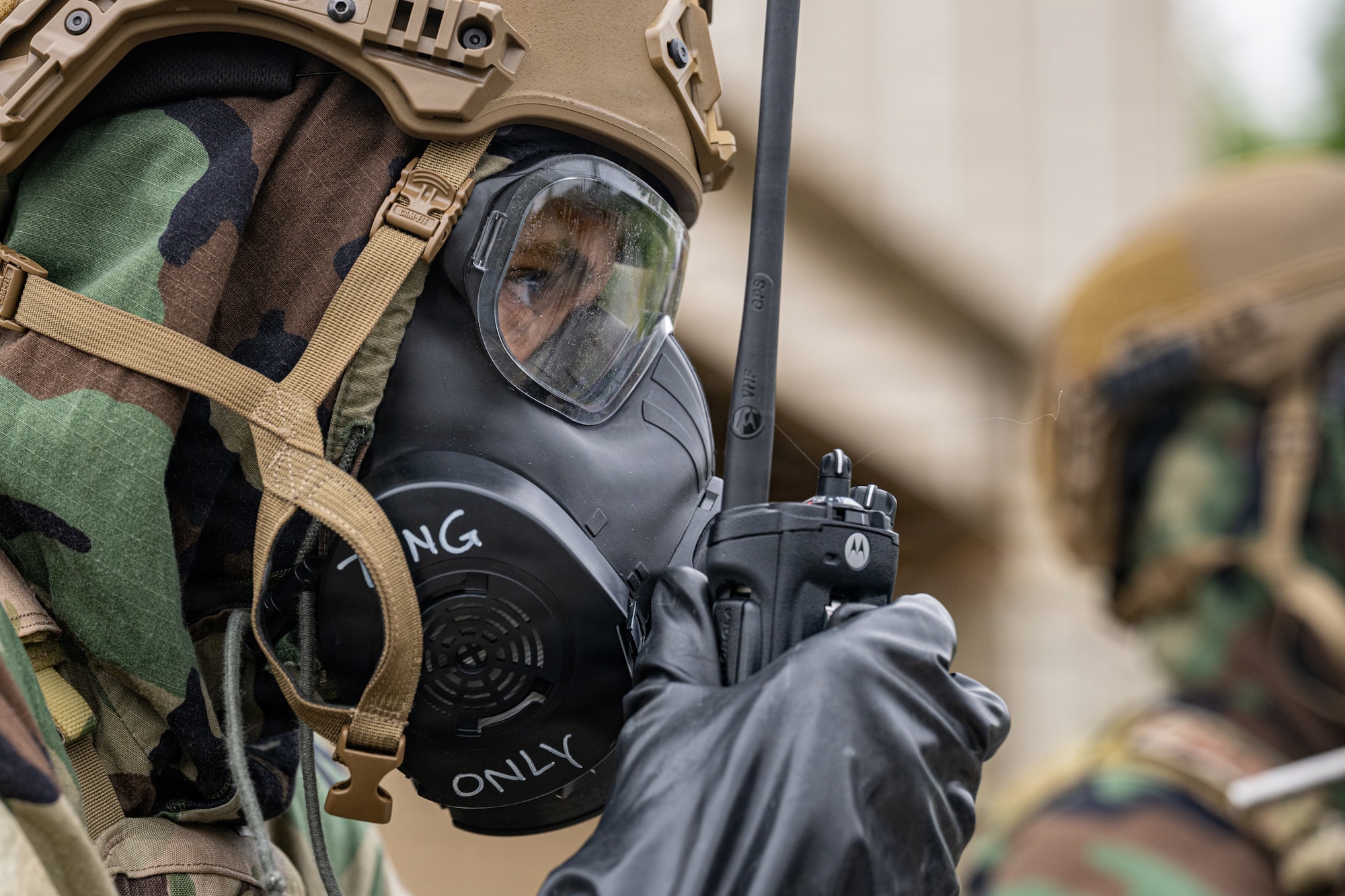 U.S. Air Force Senior Airman Nicholas Peddie, 35th Civil Engineer Squadron Emergency Management technician, conducts a post-attack reconnaissance sweep during a chemical, biological, radiological and nuclear (CBRN) training.