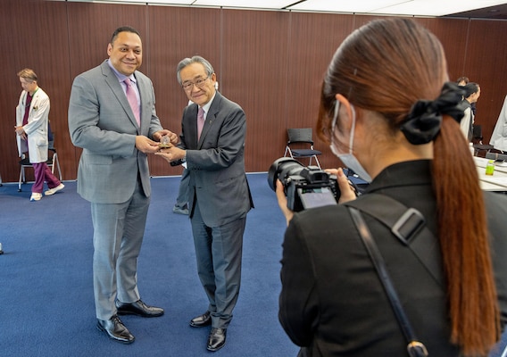 KAMAKURA, Japan (May 18, 2026) Capt. Torrin W. Velazquez, director of U.S. Naval Hospital (USNH) Yokosuka, and Dr. Shuzo Kobayashi, president and CEO of Shonan Kamakura General Hospital, display personal coins during a bilateral healthcare engagement. The engagement focused on healthcare coordination, regional medical collaboration and strengthening professional relationships between USNH Yokosuka and host-nation healthcare partners. (U.S. Navy photo by Daniel Taylor/U.S. Naval Hospital Yokosuka)
