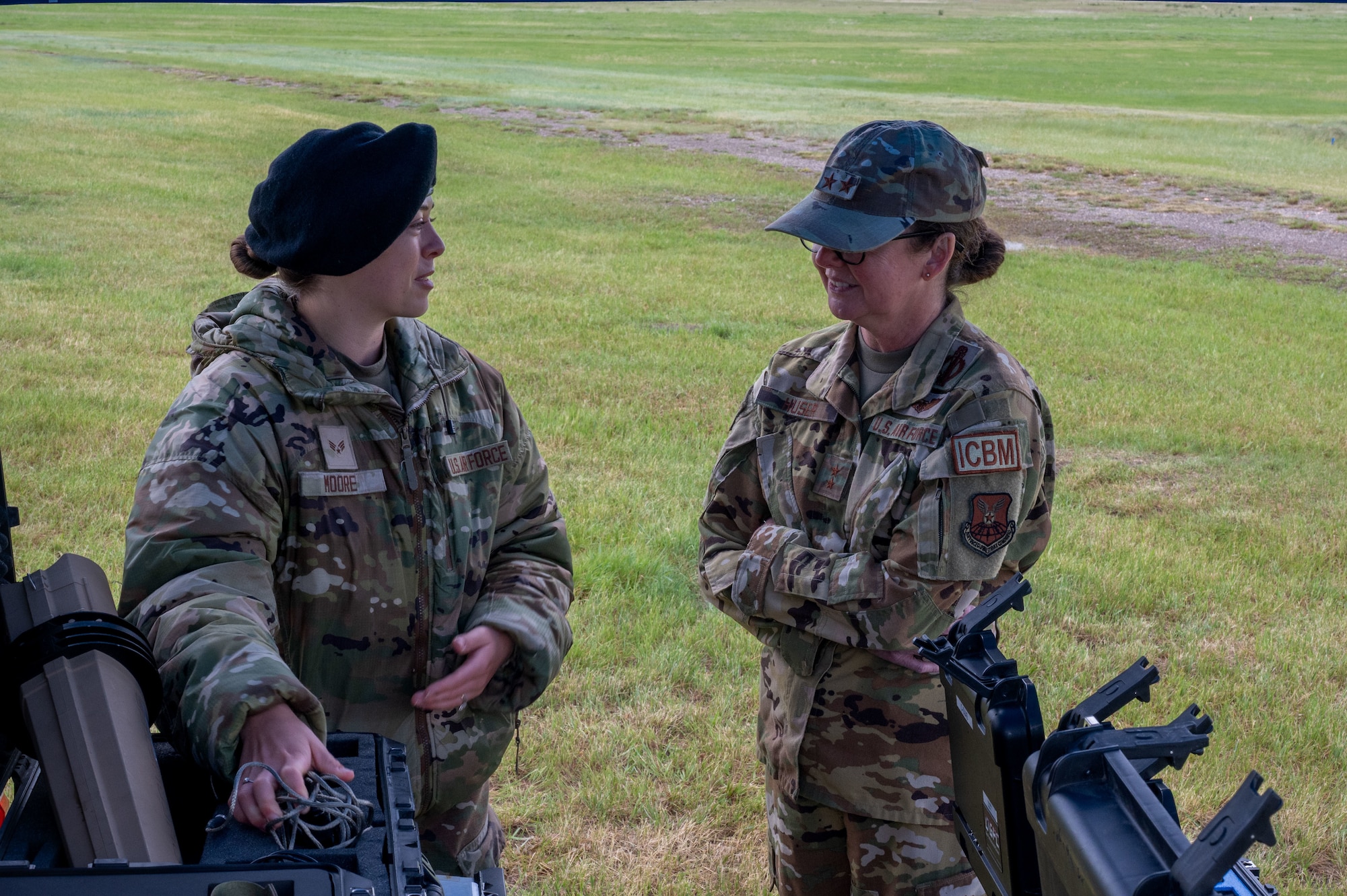 U.S. Air Force Senior Airman Lauren Moore, 341st Missile Security Operations Squadron counter-small unmanned aircraft systems (C-sUAS) technician, describes recent technological advancements in the field of C-sUAS to Maj. Gen. Stacy Jo Huser, 20th Air Force commander, at Malmstrom Air Force Base, Montana, June 2, 2026.