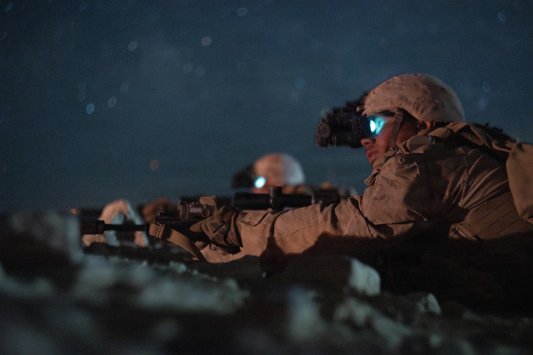 U.S. Marines with 1st Battalion, 24th Marines, 4th Marine Division, suppress simulated enemy positions during a live fire night platoon attack on Range 410 Alpha as part of Integrated Training Exercise 3-26, Marine Corps Air Ground Combat Center Twentynine Palms, California, June 7, 2026. ITX is designed to generate combat readiness and ensure the Reserve Component provides critical strategic depth to the Total Force. From complex combined arms maneuvers to all-domain integration, these Marines are proving that they are ready to augment, reinforce, and fight alongside the active component at a moment's notice. (U.S. Marine Corps photo by Cpl. Van Hoang)