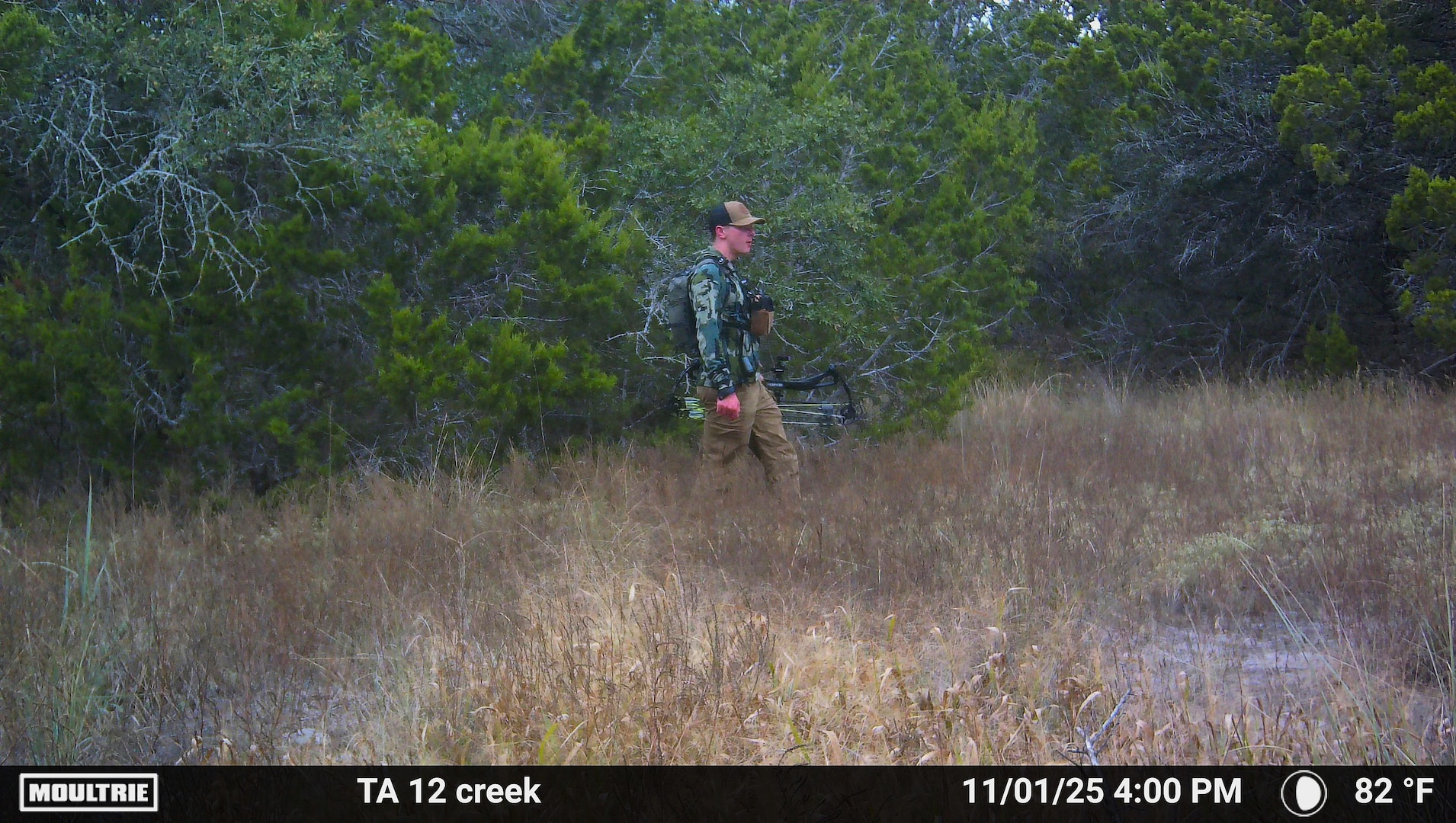 Person in hunting gear from trail camera
