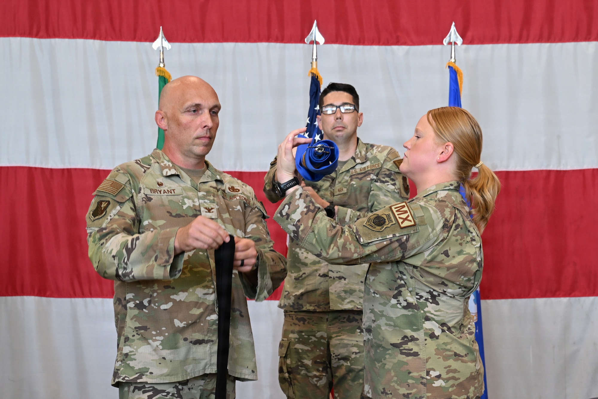 Commanders cases the 56th Squadron guidon.