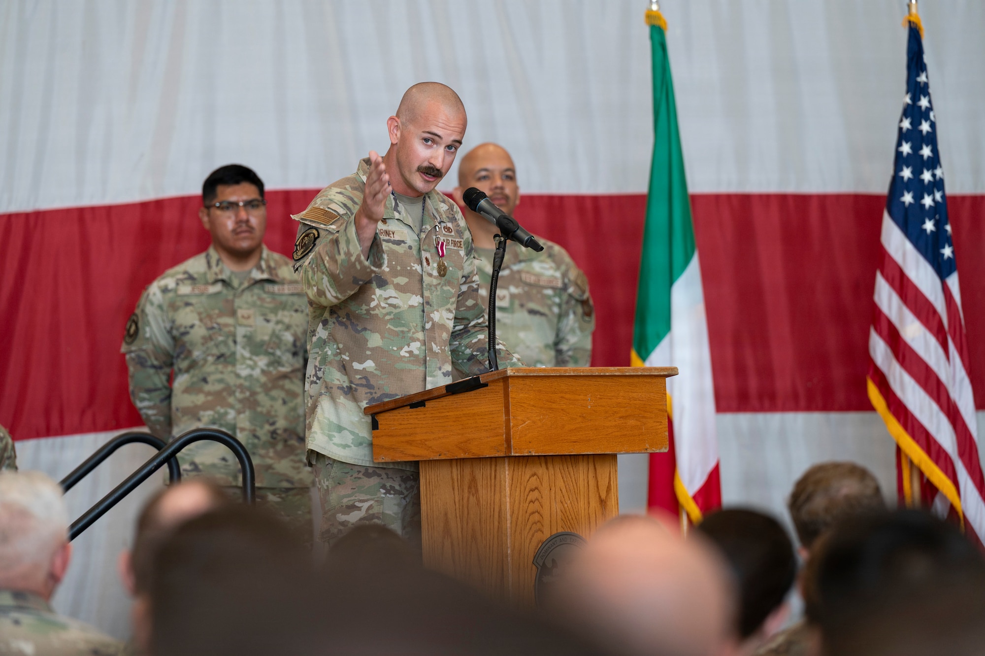 Major Briney gives a speech to the crowd.