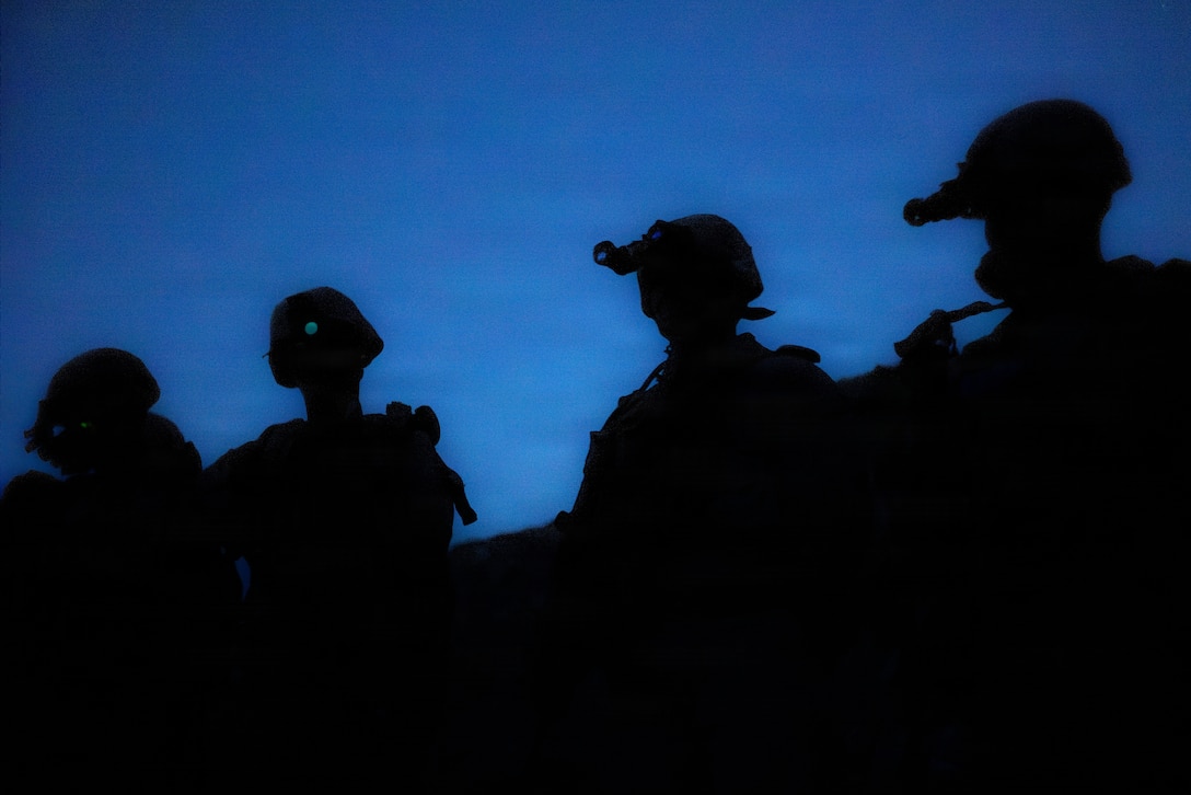 U.S. Marines with 1st Battalion, 24th Marines, 4th Marine Division, conduct pre-combat checks and inspections during a live fire night platoon attack on Range 410 Alpha as part of Integrated Training Exercise 3-26, Marine Corps Air Ground Combat Center Twentynine Palms, California, June 7, 2026. ITX is designed to generate combat readiness and ensure the Reserve Component provides critical strategic depth to the Total Force. From complex combined arms maneuvers to all-domain integration, these Marines are proving that they are ready to augment, reinforce, and fight alongside the active component at a moment's notice. (U.S. Marine Corps photo by Cpl. Van Hoang)
