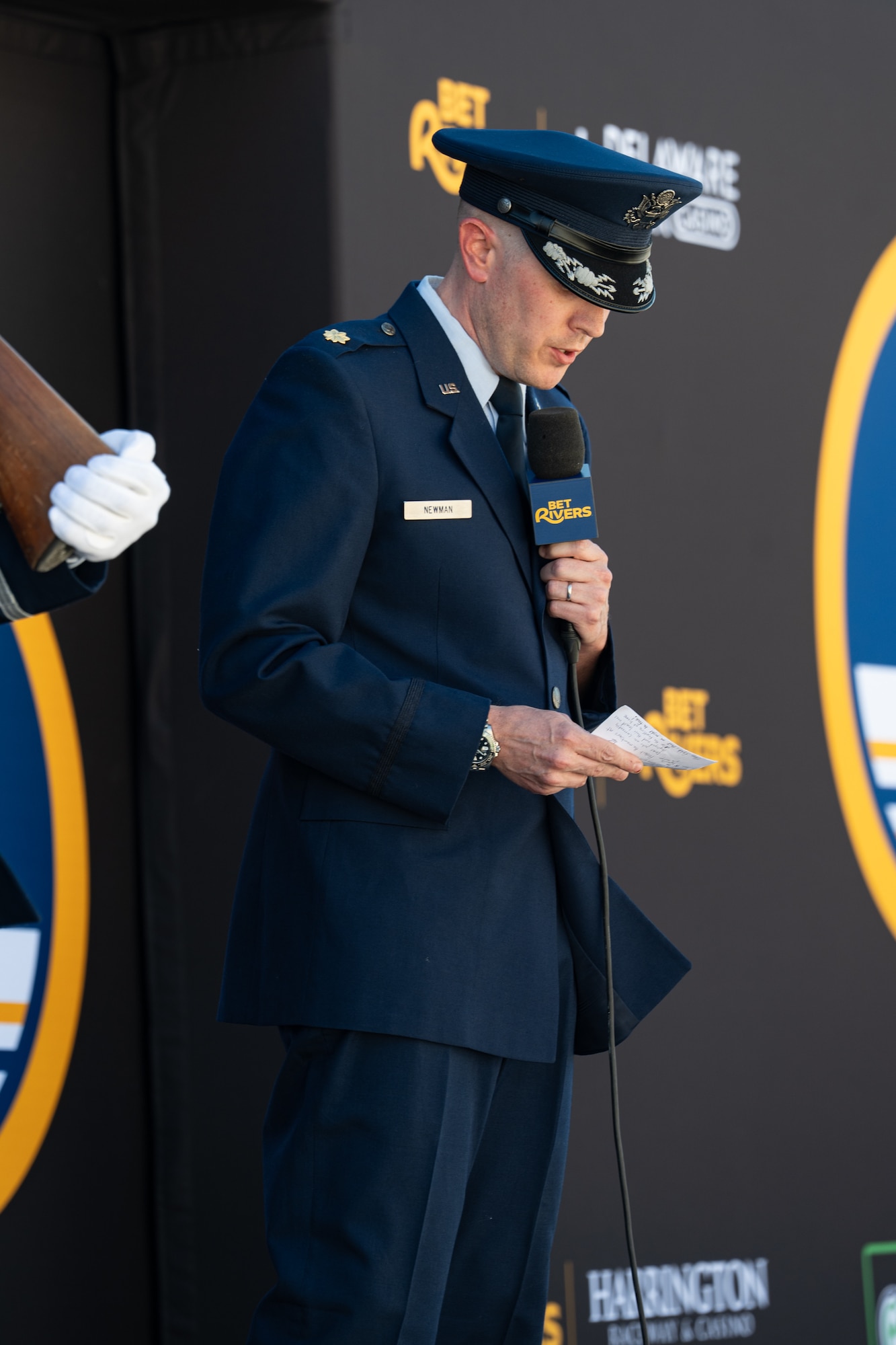 U.S. Air Force Maj. Nathan Newman, 512th Airlift Wing chaplain, speaks during the NASCAR All-Star Race weekend at the Dover Motor Speedway in Dover, Delaware, May 16, 2026. Chaplain Newman spoke during the opening ceremony of the NASCAR O’Reilly Series BetRivers 200 as part of the All-Star Race weekend. (U.S. Air Force photo by Airman 1st Class Macy Dismore-Mann)