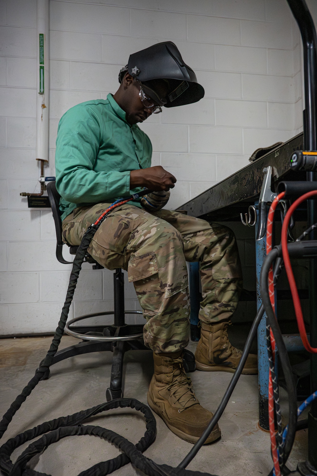 U.S. Air Force Airman 1st Class Joseph Williams, 436th Maintenance Squadron metals technology apprentice, prepares his equipment for welding two pieces of metal together on Dover Air Force Base, Delaware, June 4, 2026.